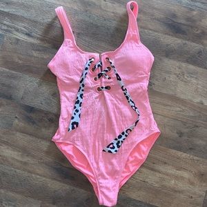 Pink cow one piece